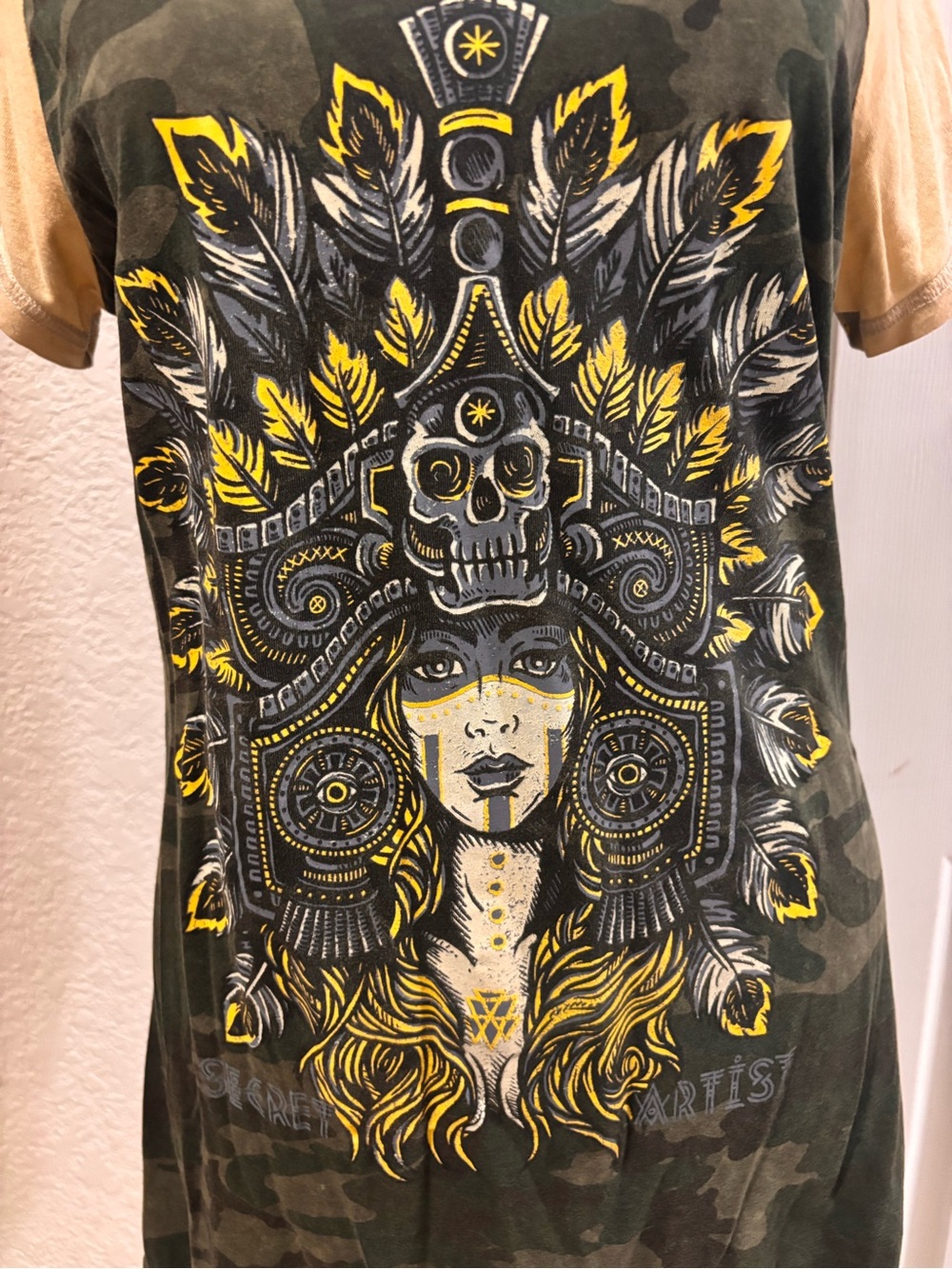 Women’s Distressed Short-Sleeve Graphic Tee in Olive with Yellow Print.